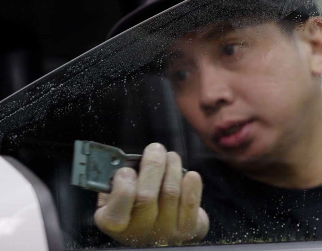 A Charlotte window tinting expert