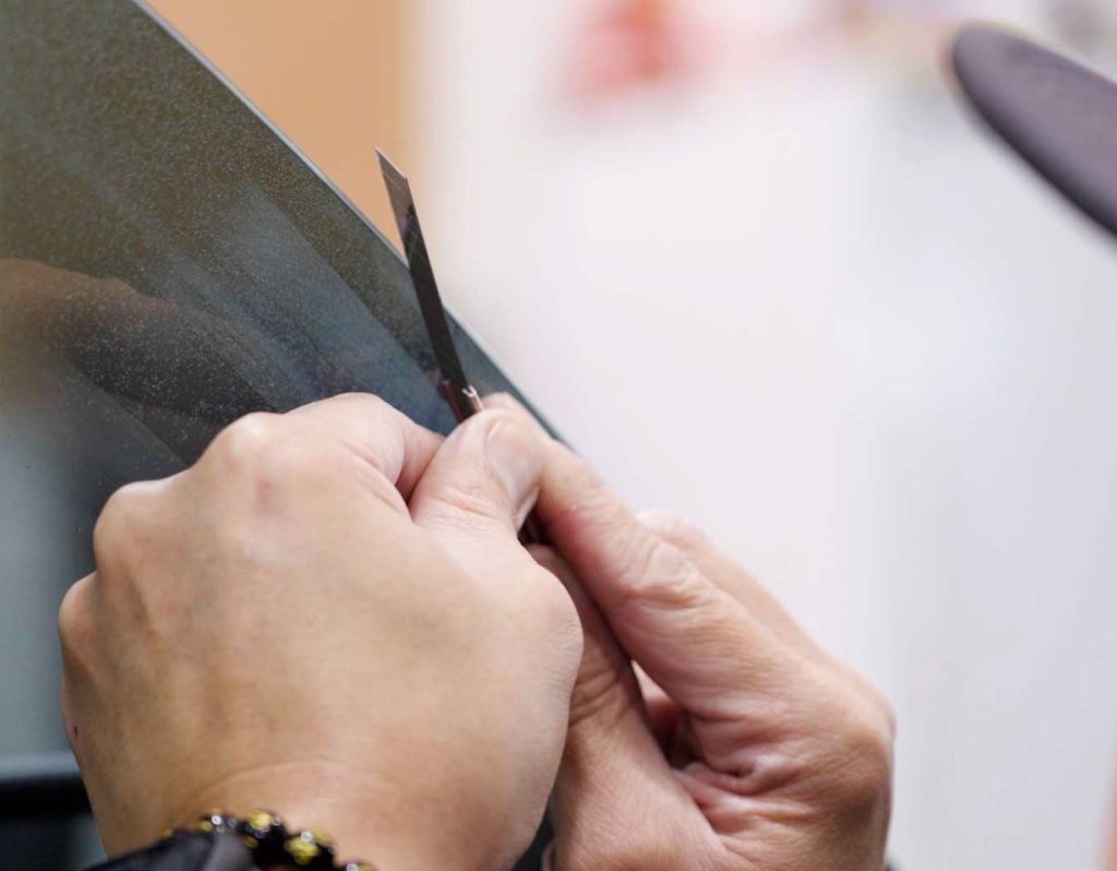 A Charlotte window tinting expert